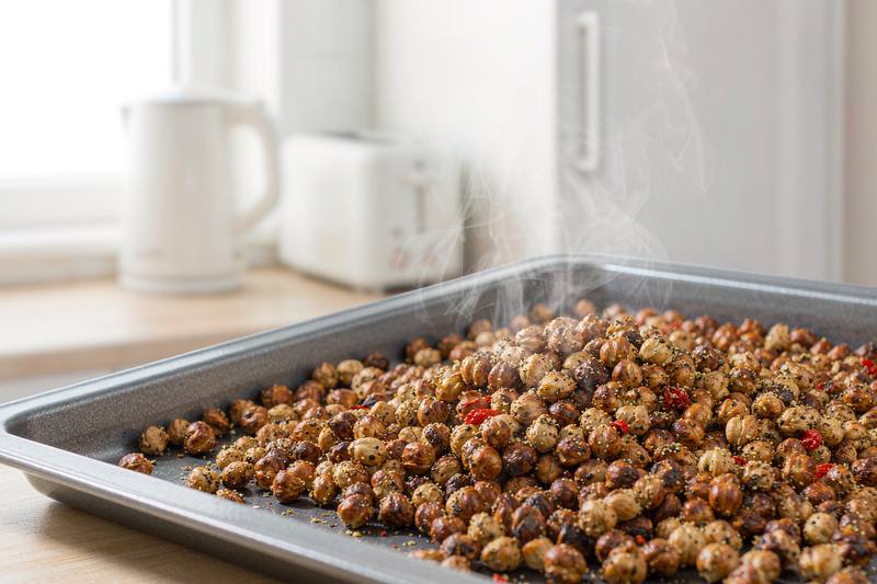 Kale Caesar With Crispy Chickpeas and Yogurt Dressing: step 1 - Heat the oven and dry the chickpeas
