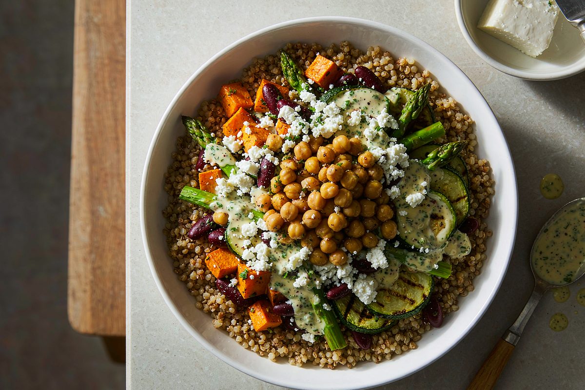 Chickpea and roasted vegetable bowl with bulgur lemon herb dressing and feta